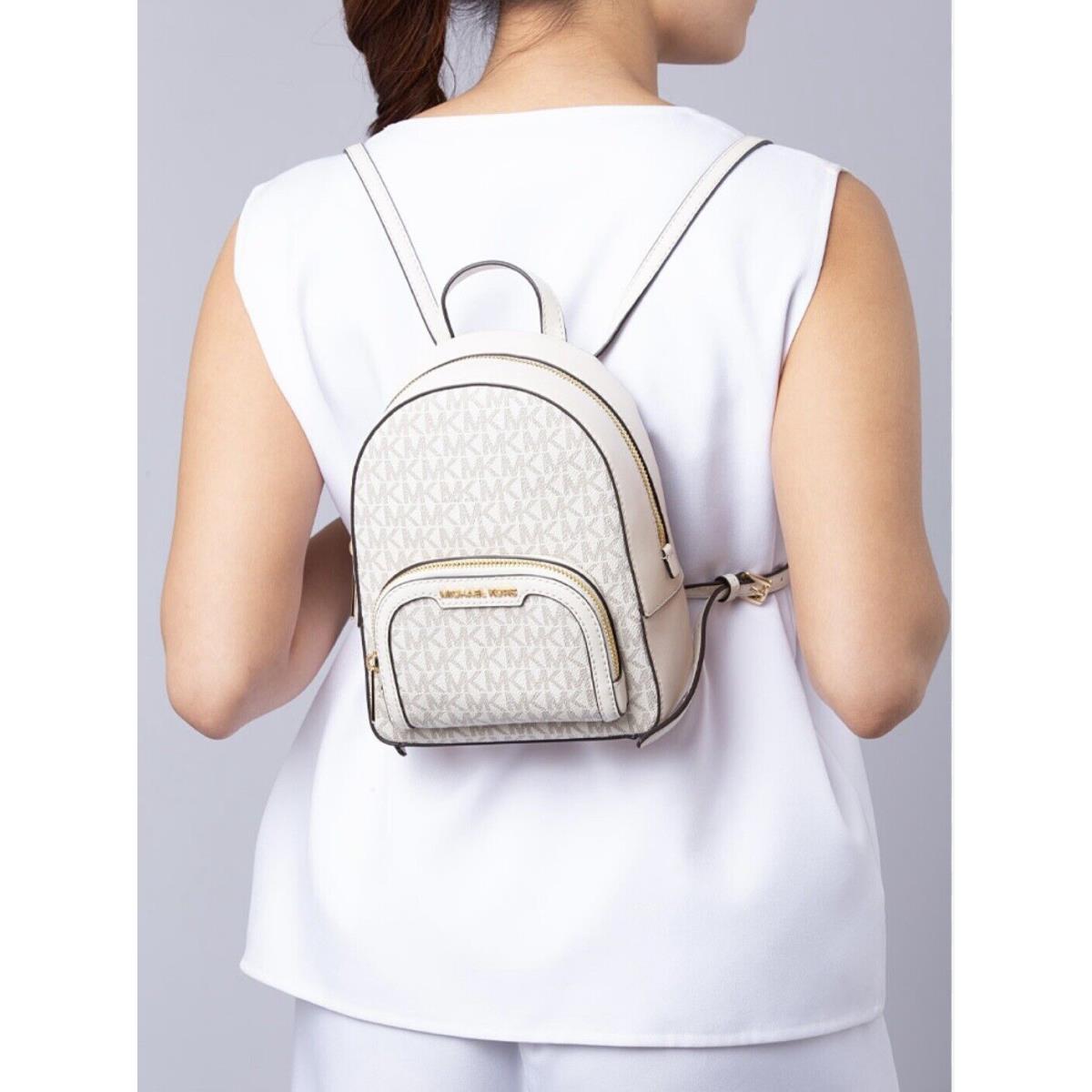 Michael Kors Jaycee XS Convertible Zip Pocket Backpack Bag Vanilla Light Cream