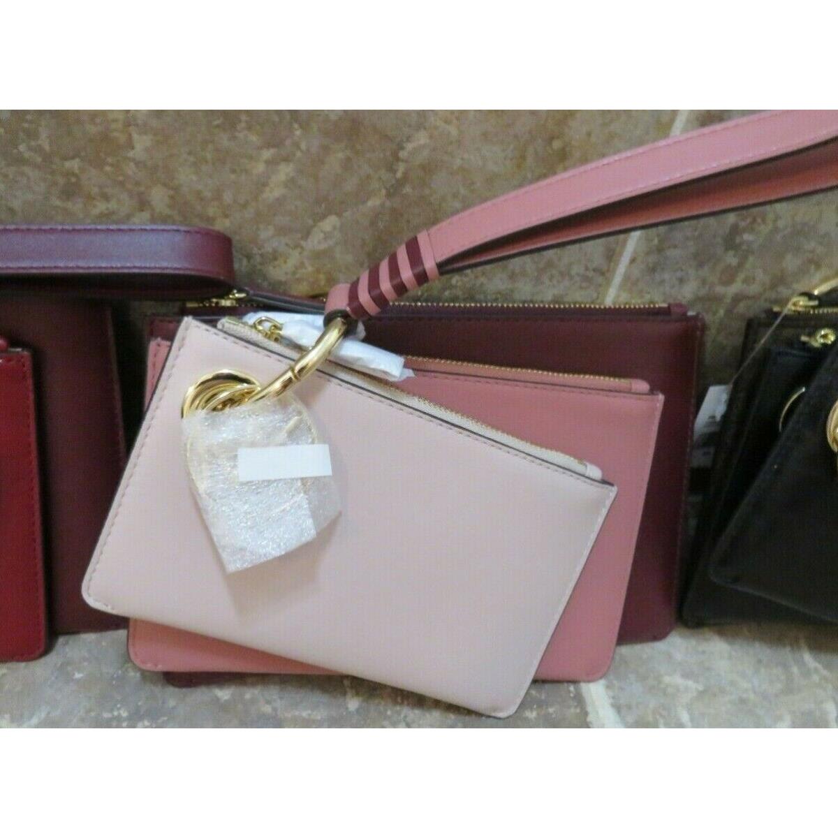 Michael Kors Wristlet/clutch Set: 3 Sizes + Charm + Ring + Strap Interchangeable Pink light, medium, oxblood w/ gold