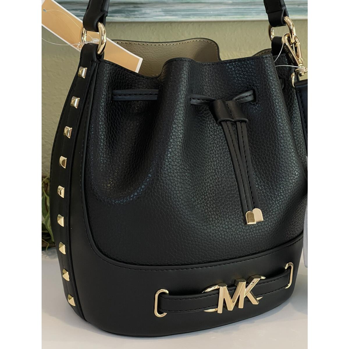 Michael kors black online purse with gold studs