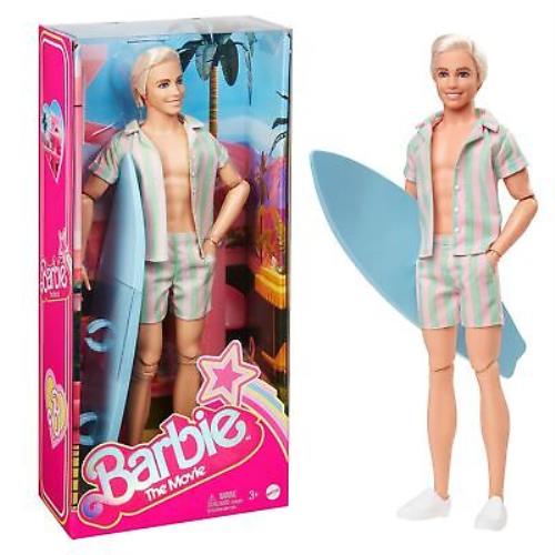 Barbie The Movie Ken Doll Wearing Pastel Pink and Green Striped Beach Matching