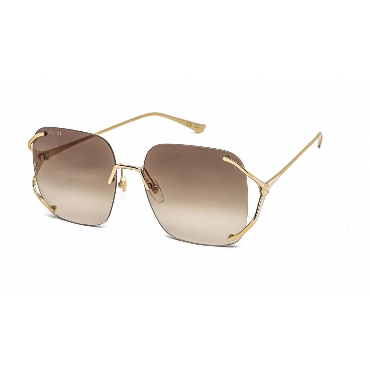 Gucci Women`s Sunglasses Gold Oversized Frame Brown Gradient Lens GG0646S 002