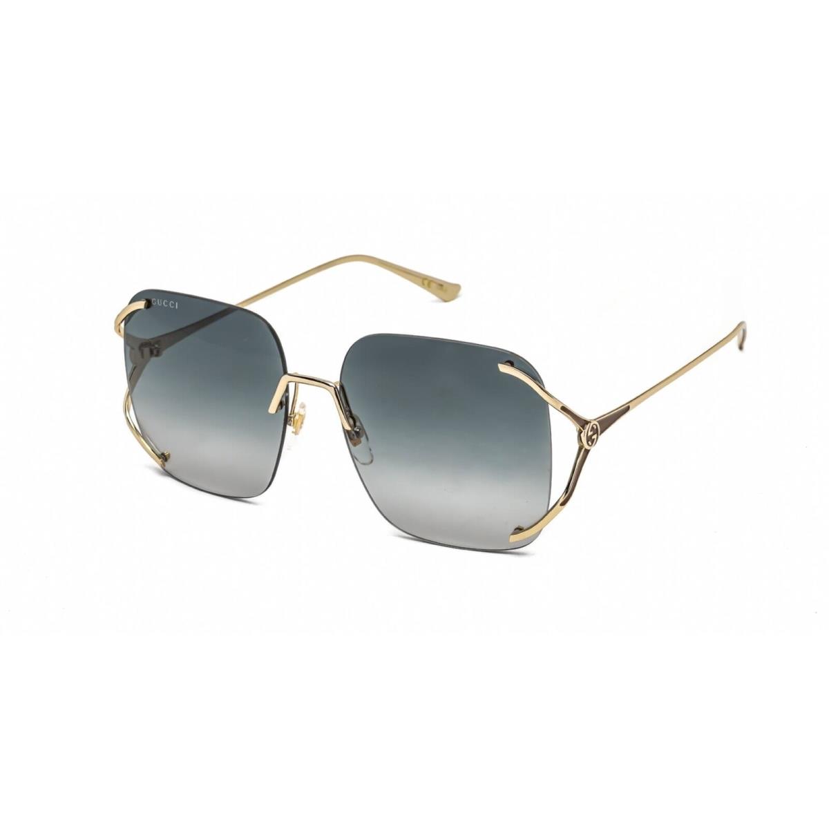 Gucci Unisex Sunglasses Gold Oversized Metal Rimless Frame GG0646S 001