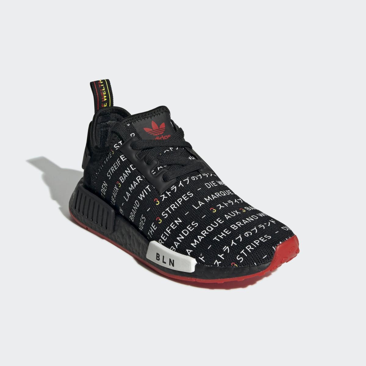 Adidas nmd hotsell youth size black