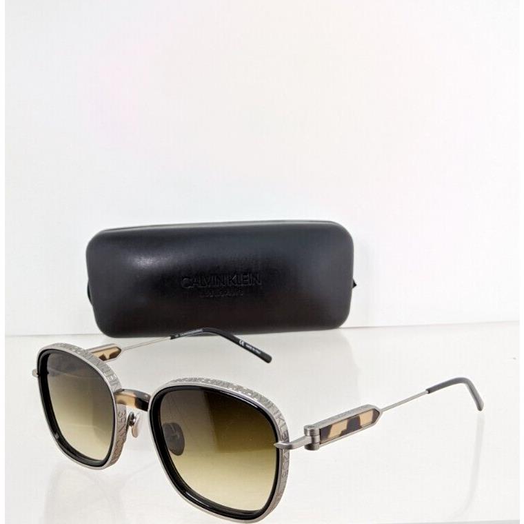 Calvin Klein sunglasses  - Frame: Grey silver & Tortoise, Lens: Green 1