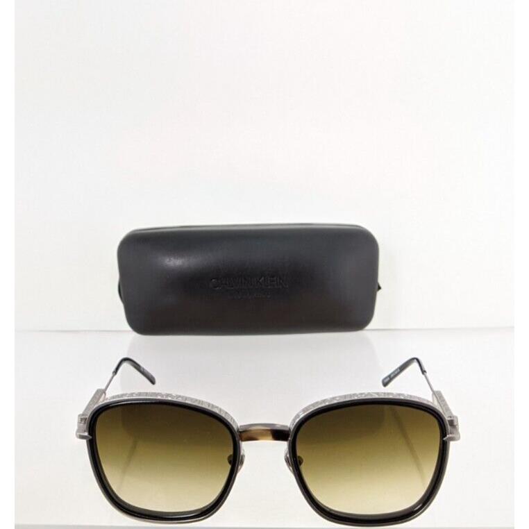 Calvin Klein sunglasses  - Frame: Grey silver & Tortoise, Lens: Green 2