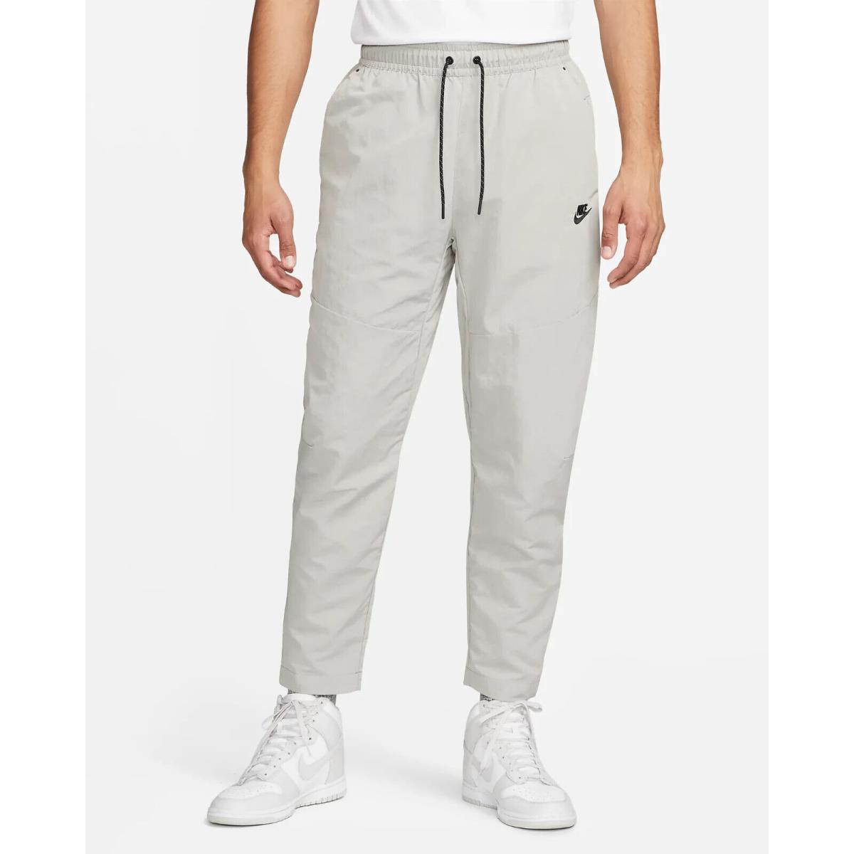 Men`s M Nike Sportswear Tech Essentials Lined Commuter Pants Rain Repel DQ4343