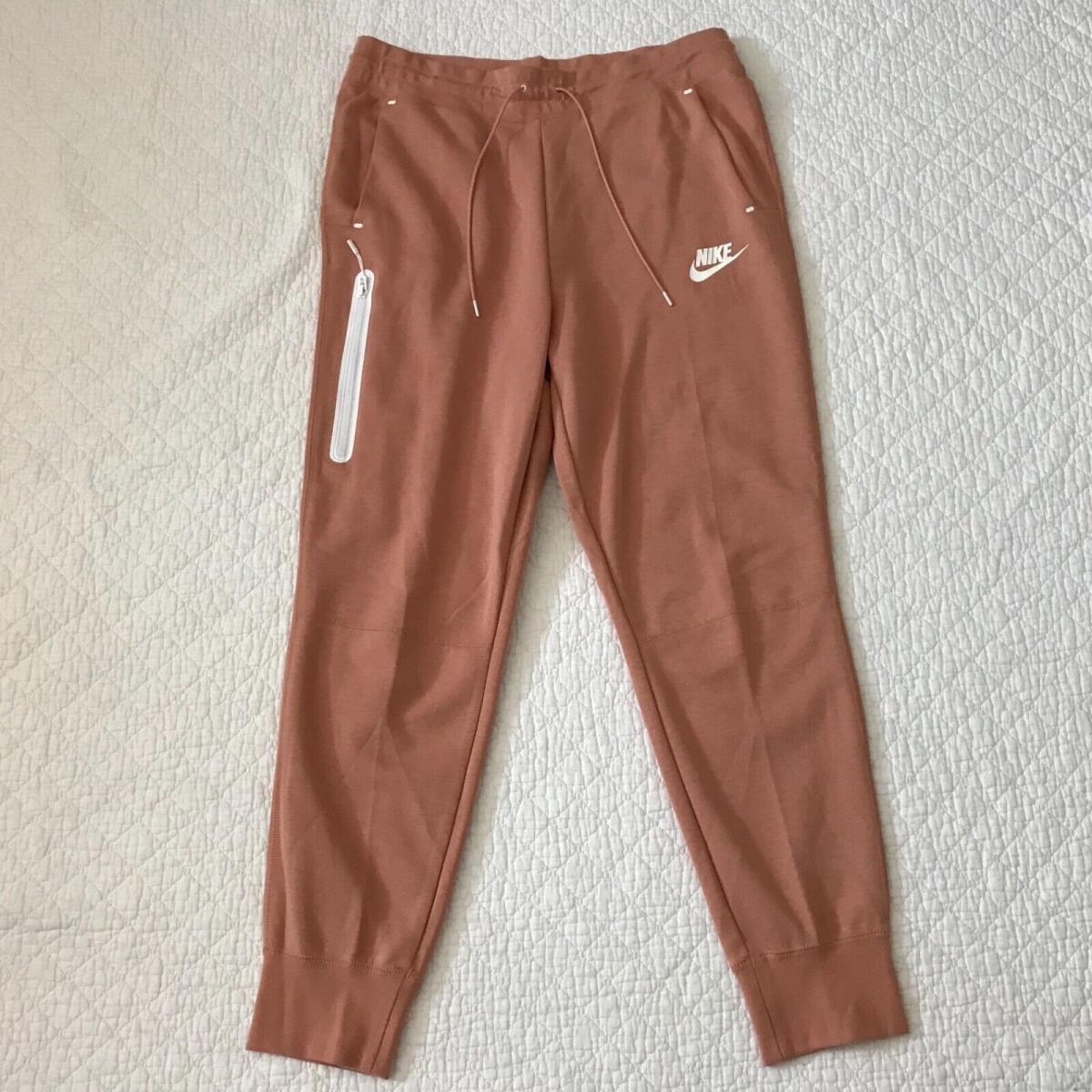 Nike Sportswear Fleece Pants Joggers Women s SZ L Peach Pink 931828-605