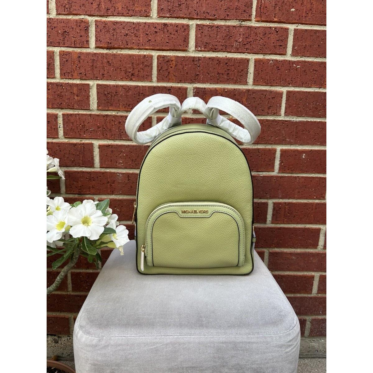 Michael kors best sale lime green backpack