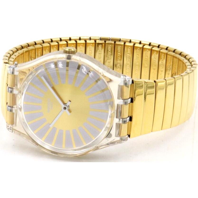 Swatch watch Rayon Soleil - Dial: Gold, Band: Gold tone, Bezel: