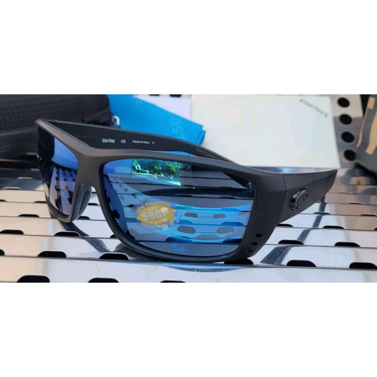 Costa Del Mar Cat Cay AT 01 Sunglasses Blackout w/ Blue 580p Polarized - Frame: Black, Lens: Blue