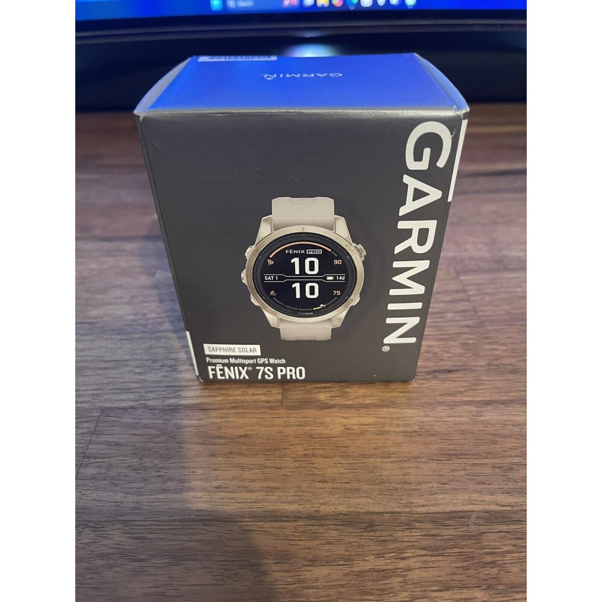 Garmin Fenix 7S Pro Solar Sapphire Solar Gold w Light Sand Band 010-02776-14