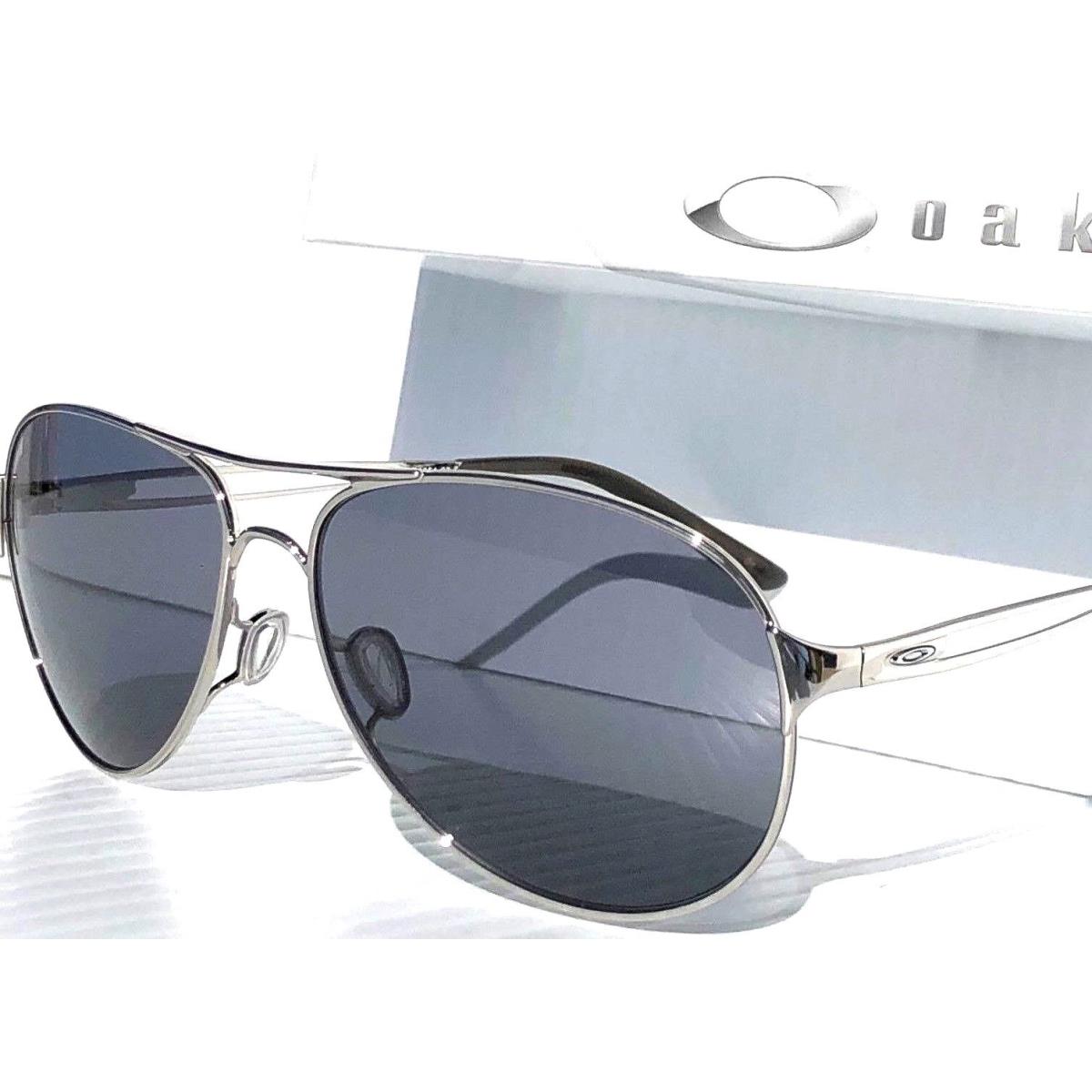 Oakley Women`s Aviator Caveat Silver 60mm Grey Iridilum Sunglass 4054-02