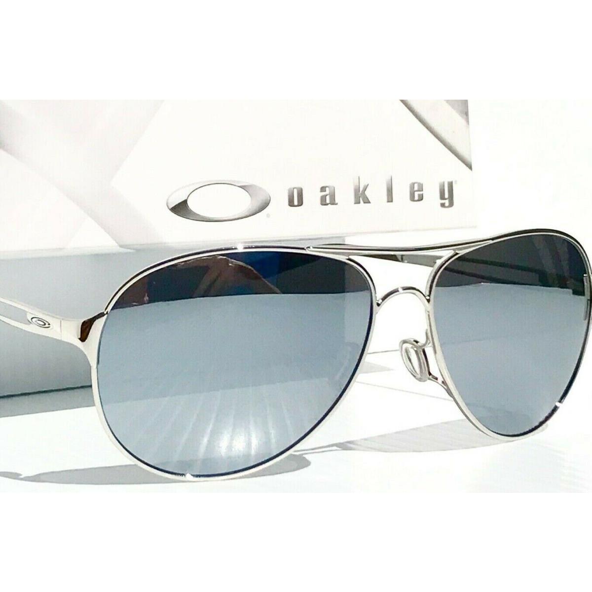 Oakley Caveat Silver Polarized Galaxy Chrome Mirrored Sunglass 4054