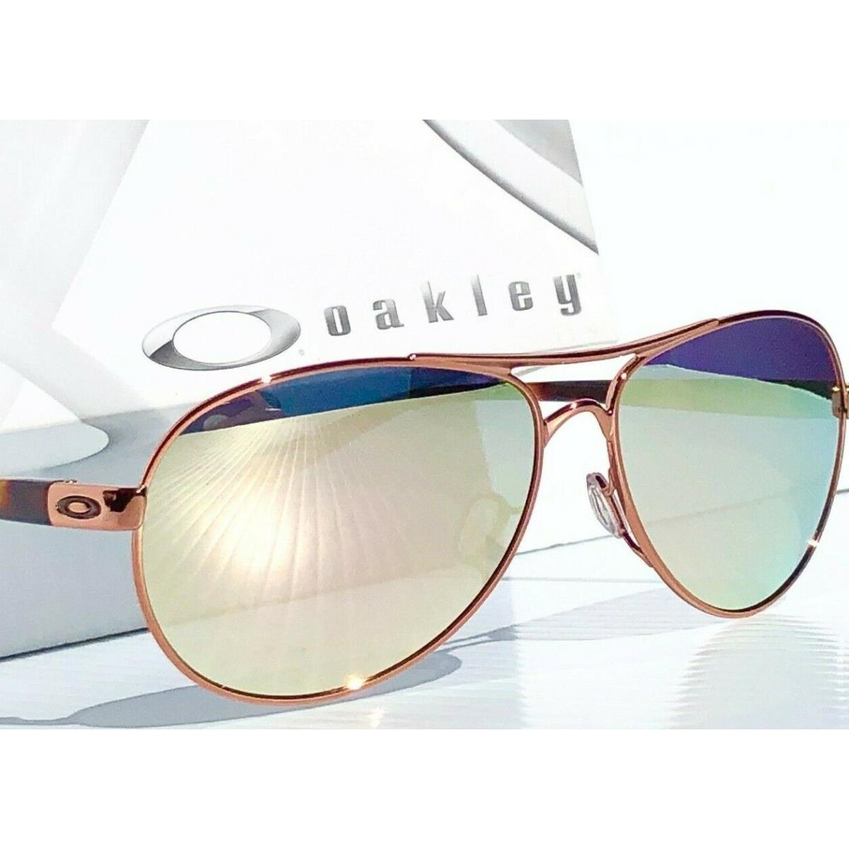 Oakley Feedback Rose Gold Polarized Galaxy Rose Mirror Aviator Women`s Sunglass