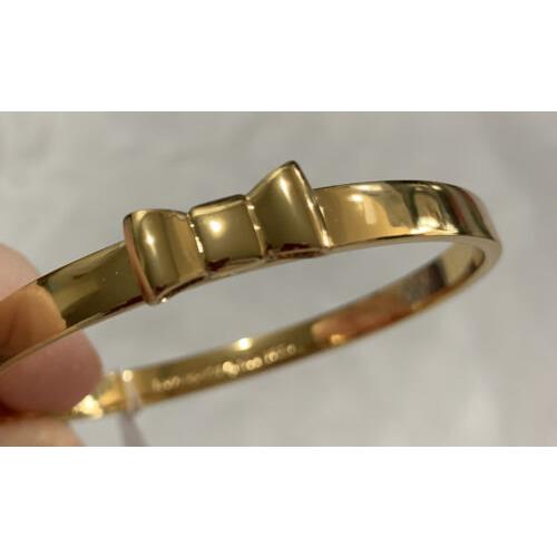 2014 Kate Spade Take A Bow Gold Tone Metal Bangle Bracelet