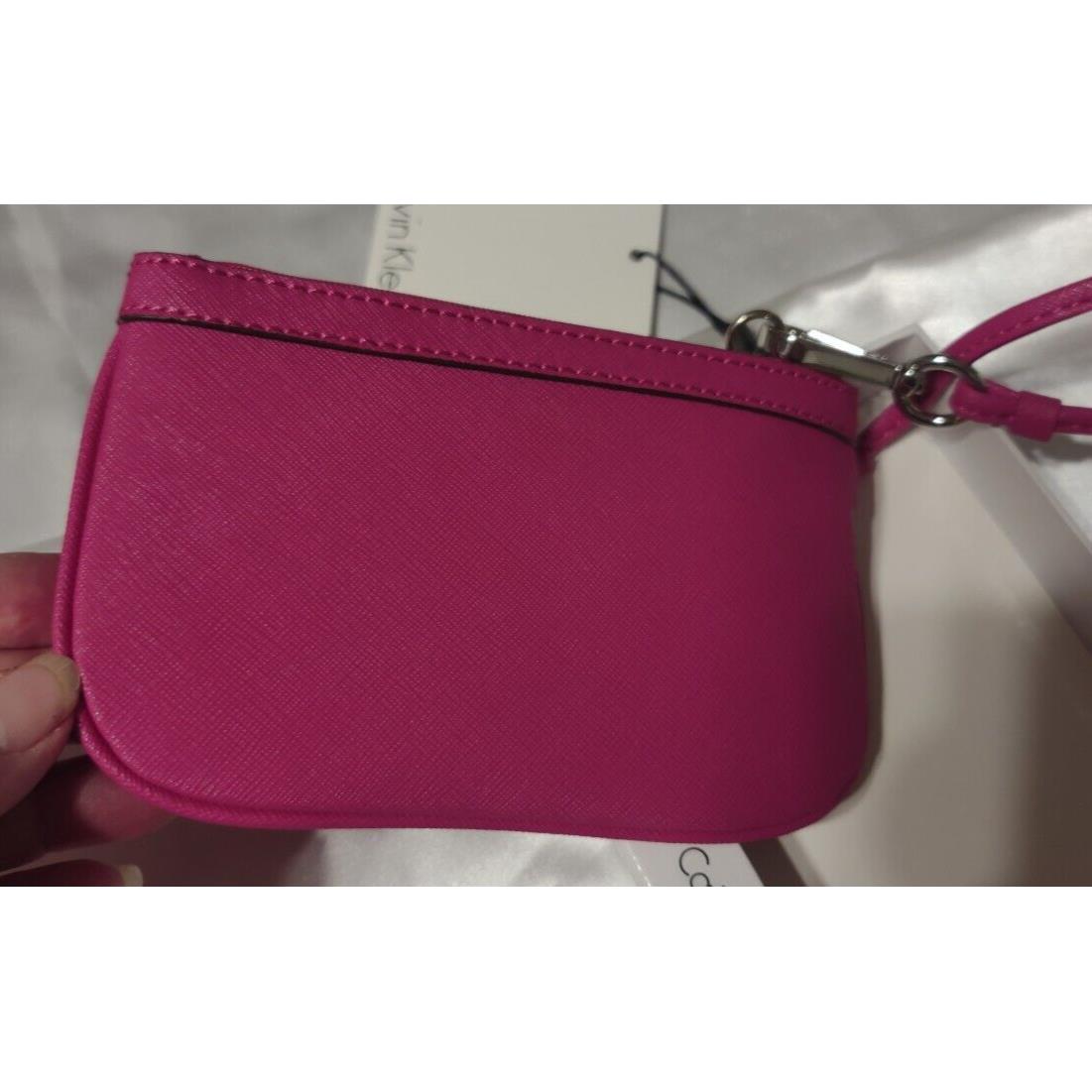 Calvin Klein`s Saffiano Leather Wristlet in Passion Pink Style H2RL1023