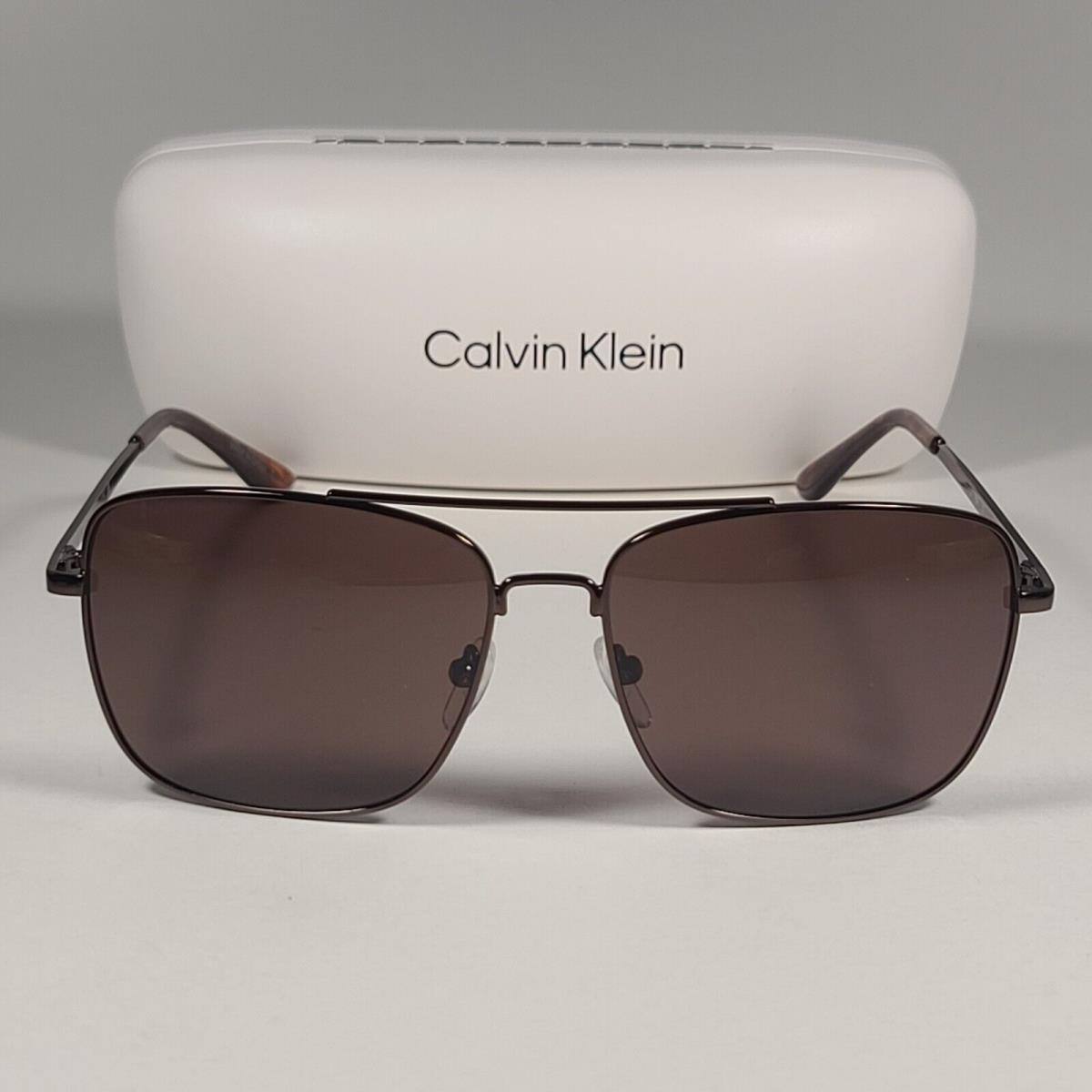 Calvin Klein Navigator Sunglasses CK19136S 200 Brown Frame Brown Lens 57 mm