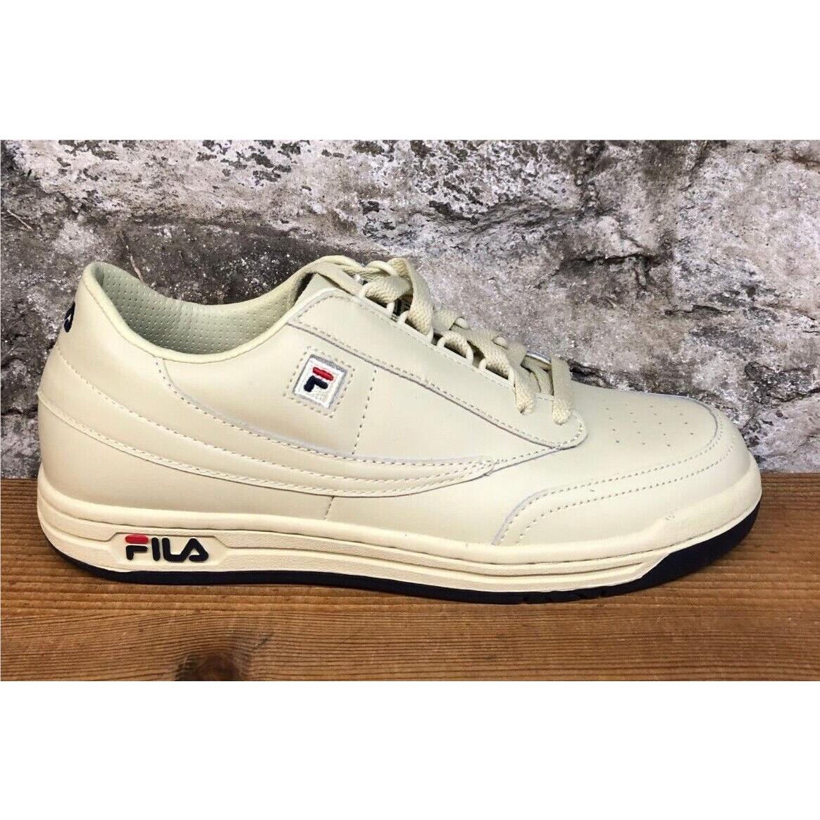 Cream fila sneakers hotsell