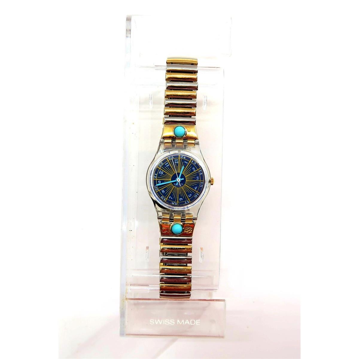 Swatch Watch Tournevis LK145 Womens with Case and Papers 1993 Ladies Nos - Dial: Blue, Band: Gold, Bezel: Clear