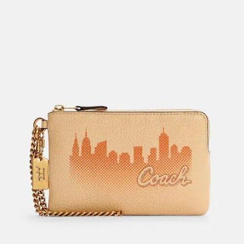 Coach X Jennifer Lopez Corner Zip Wristlet W/nyc Skyline Gold/cream C6514