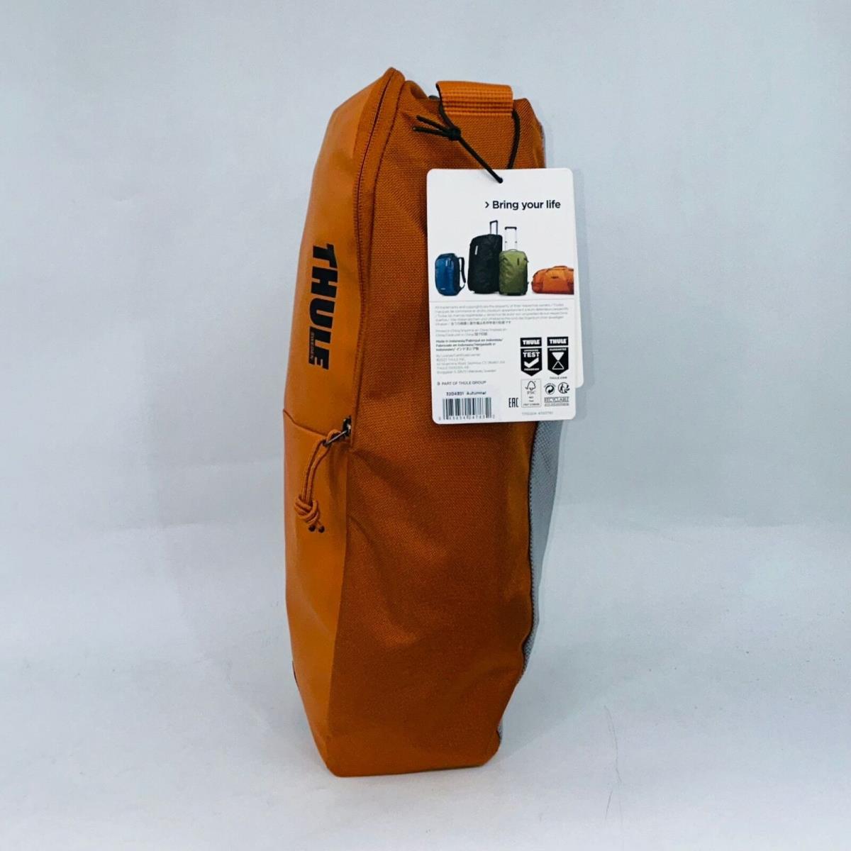 Thule Chasm 90L Autumn Orange Duffle/backpack Bag Compacktable Weather Resistant