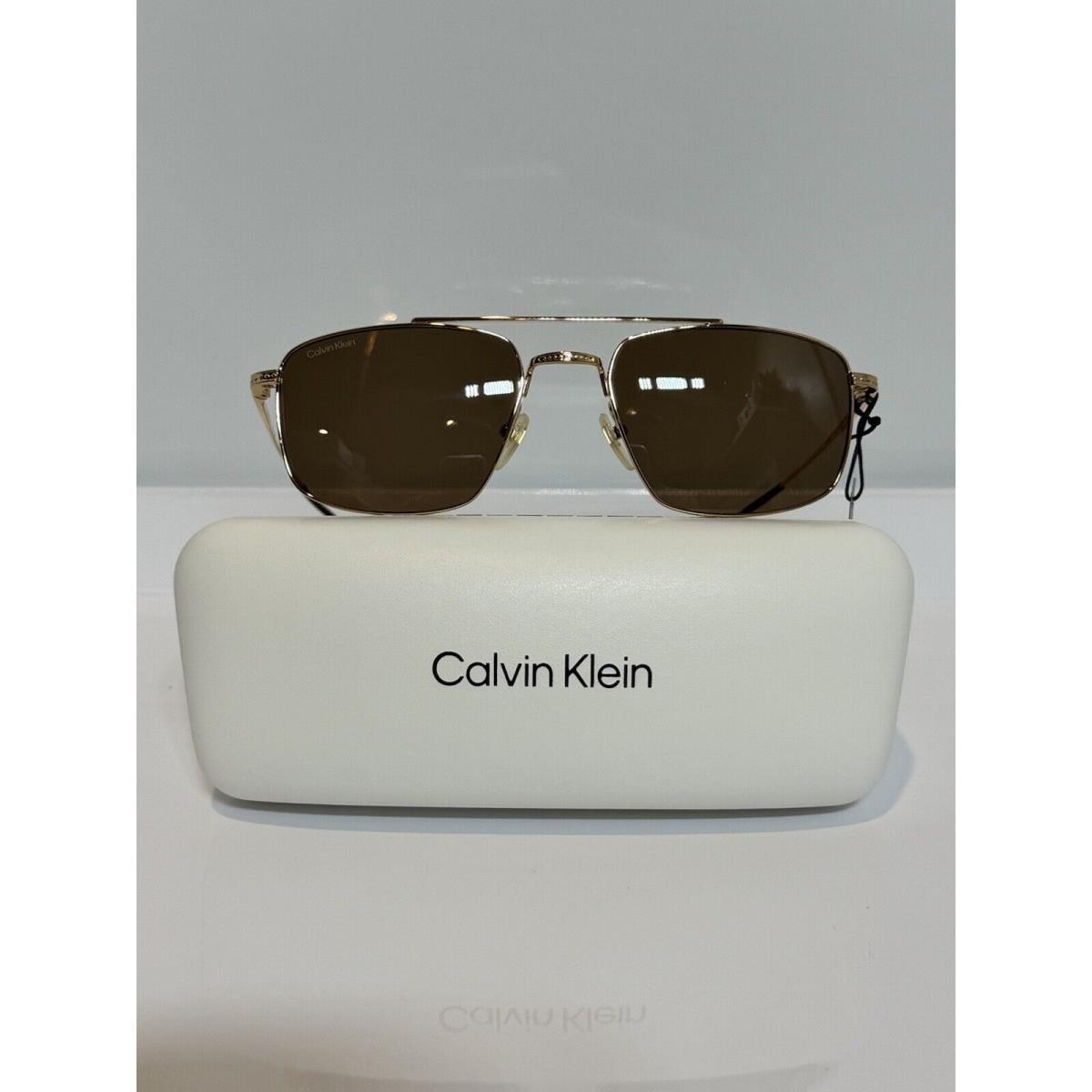 Calvin Klein CK22111TS 717 Gold Titanium Brown Sunglasses 56mm