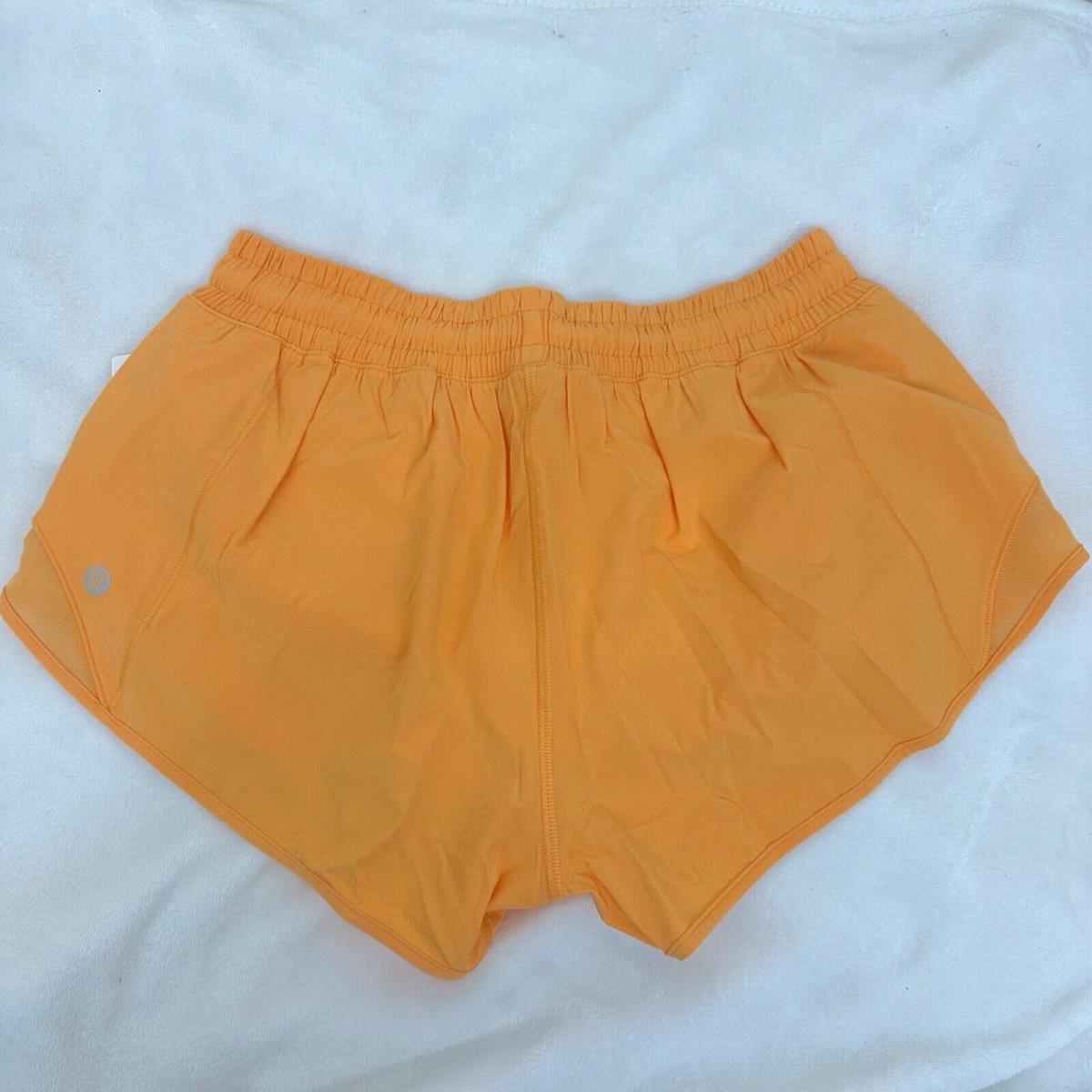 Lululemon Women`s Hotty Hot LR Short 2.5 Lined Sz 8 Mango Dream