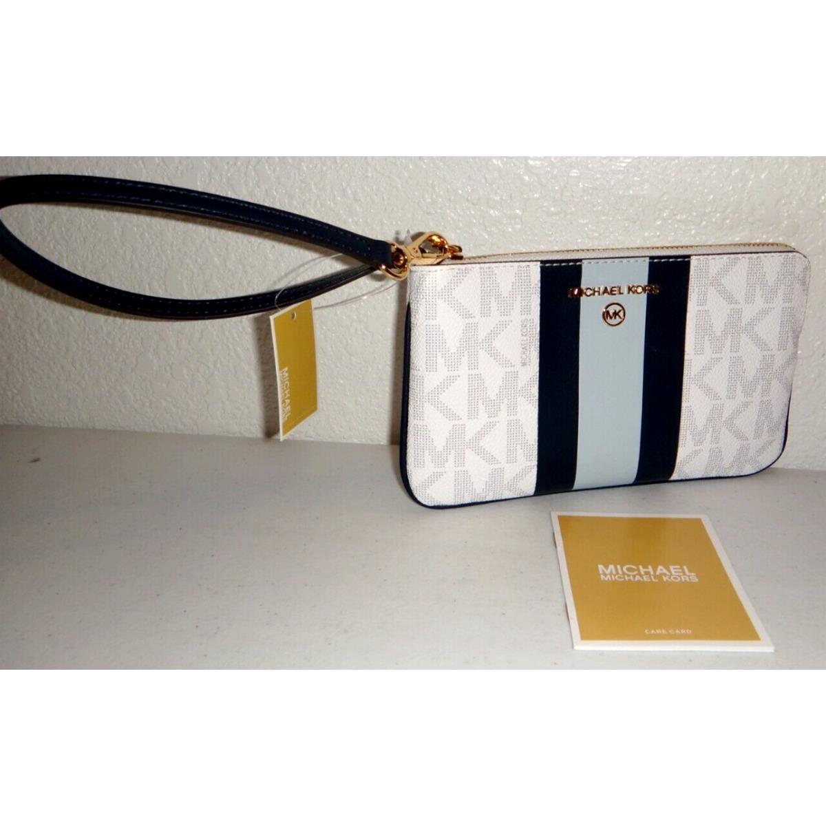 Michael kors center stripe wallet hotsell