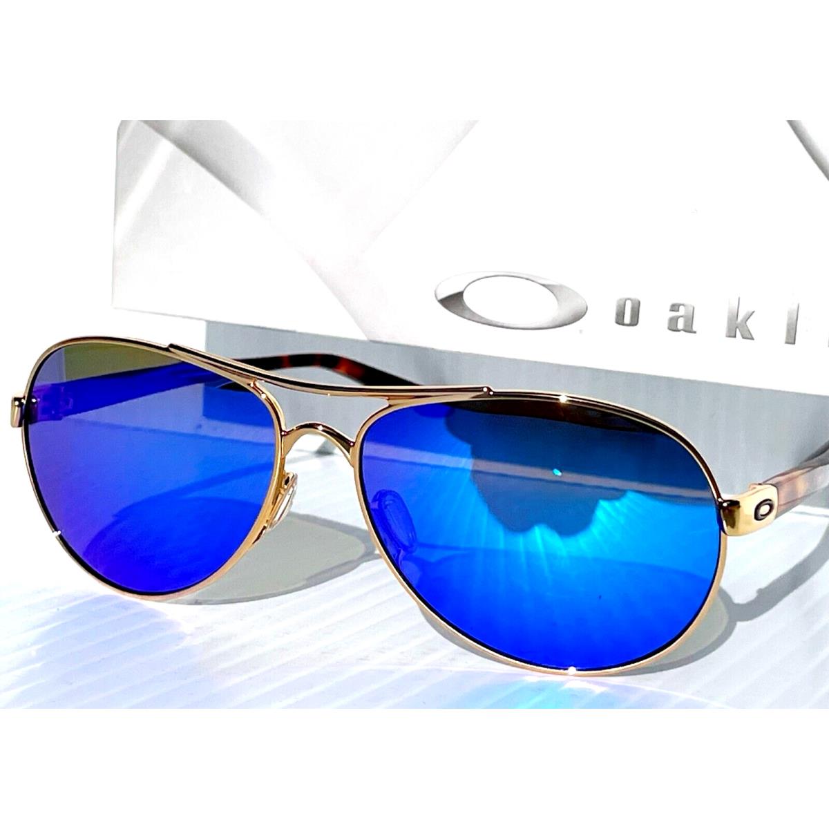 Oakley Tie Breaker Polished Gold Tort Polarized Galaxy Blue Sunglass 4108