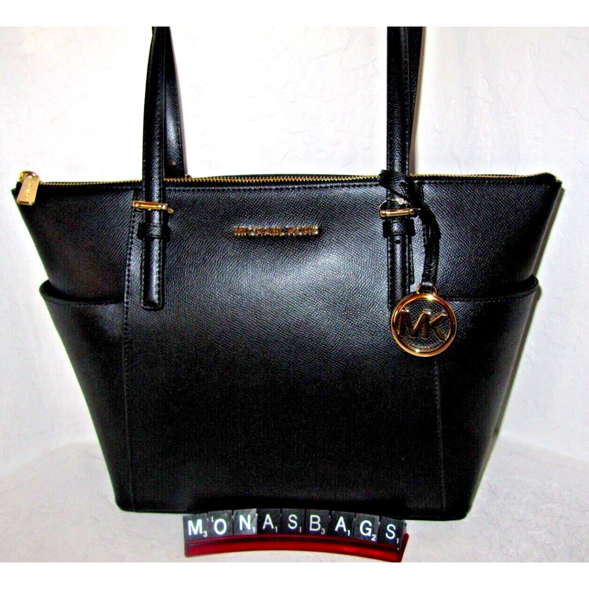 Michael Kors Black Leather Jet Set EW Top Zip Tote Bag Side Pockets