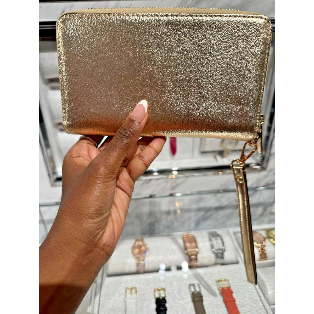 Michael kors gold wristlet wallet hotsell