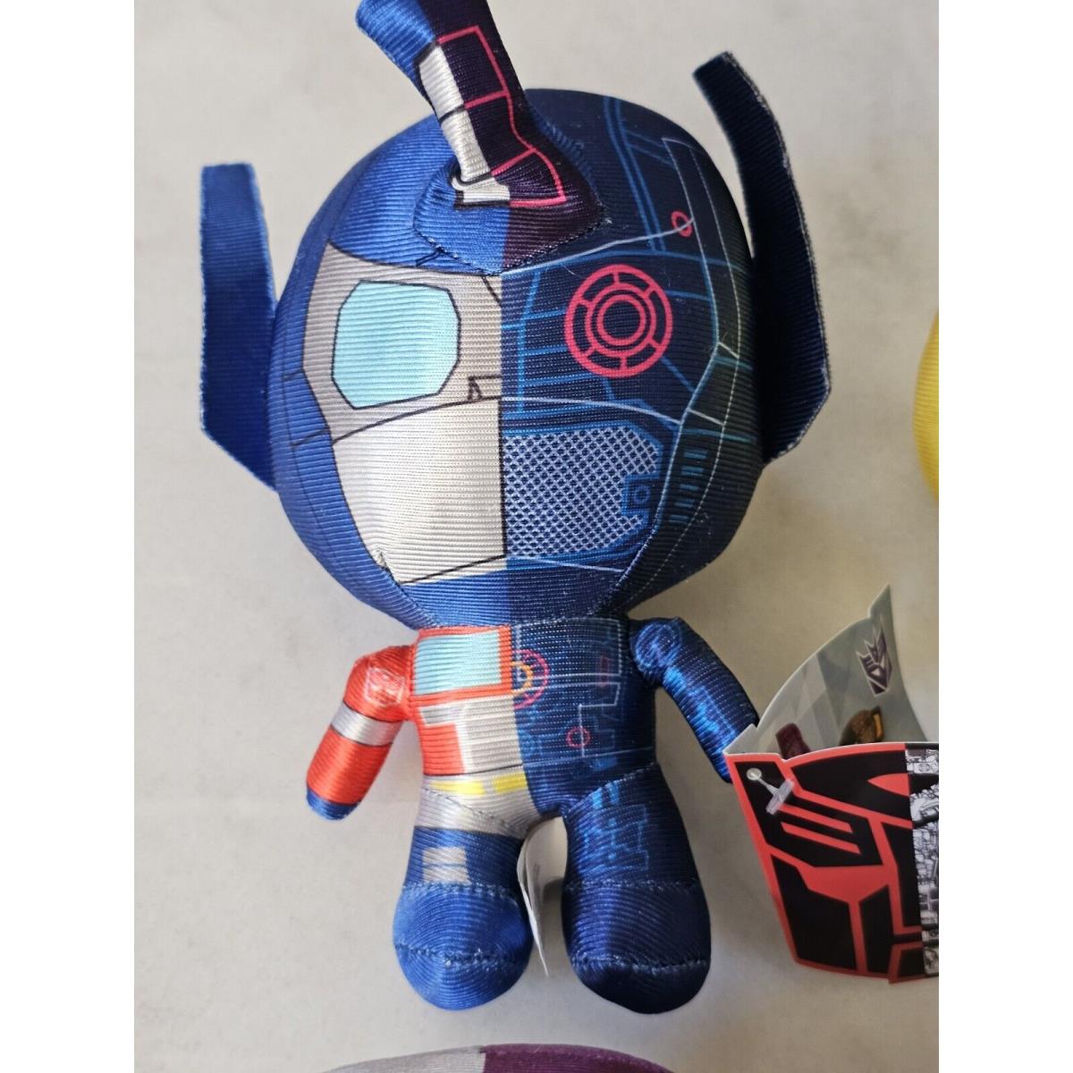 Transformers More Than Meets The Eye Plush Set Of 4 Metallic Limited Edition