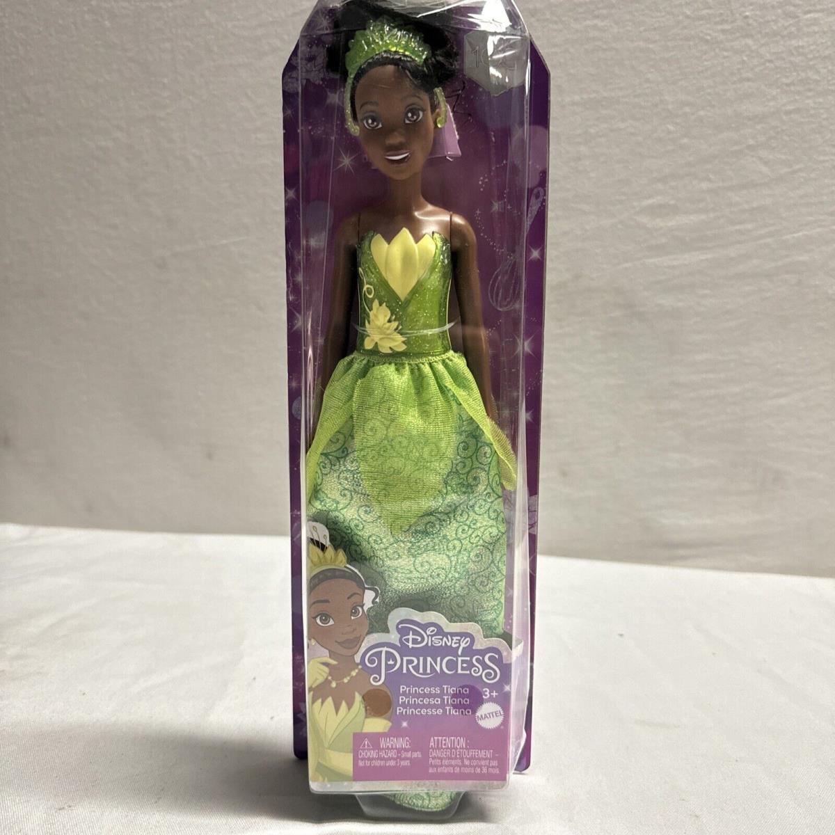 Includes Mattel - Disney Princess Barbie Doll - Princess Tiana Distress Box