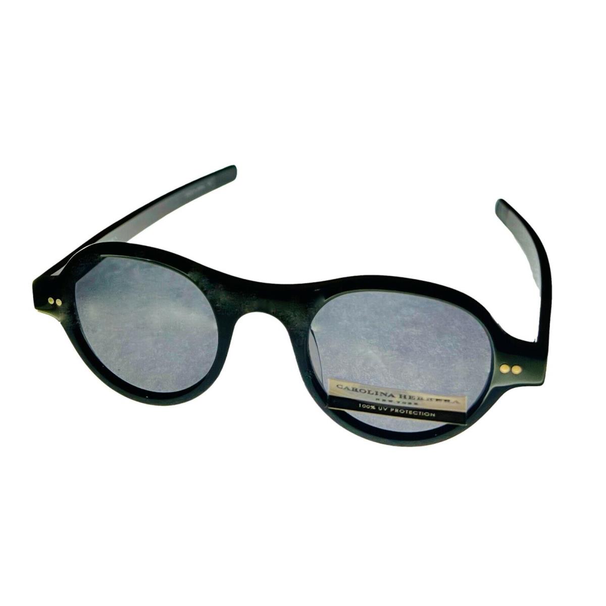 Carolina Herrera Women`s Round Black Plastic Sunglasses H703 700