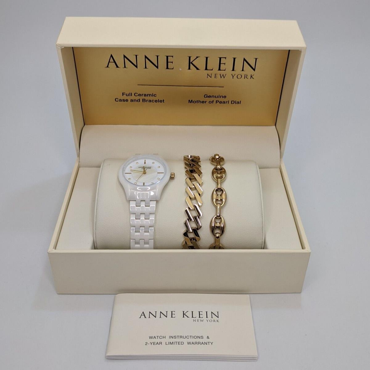 Anne Klein Ladies 12/7740WTST White Ceramic Watch w/ 2- Gold Tone SS Bracelets