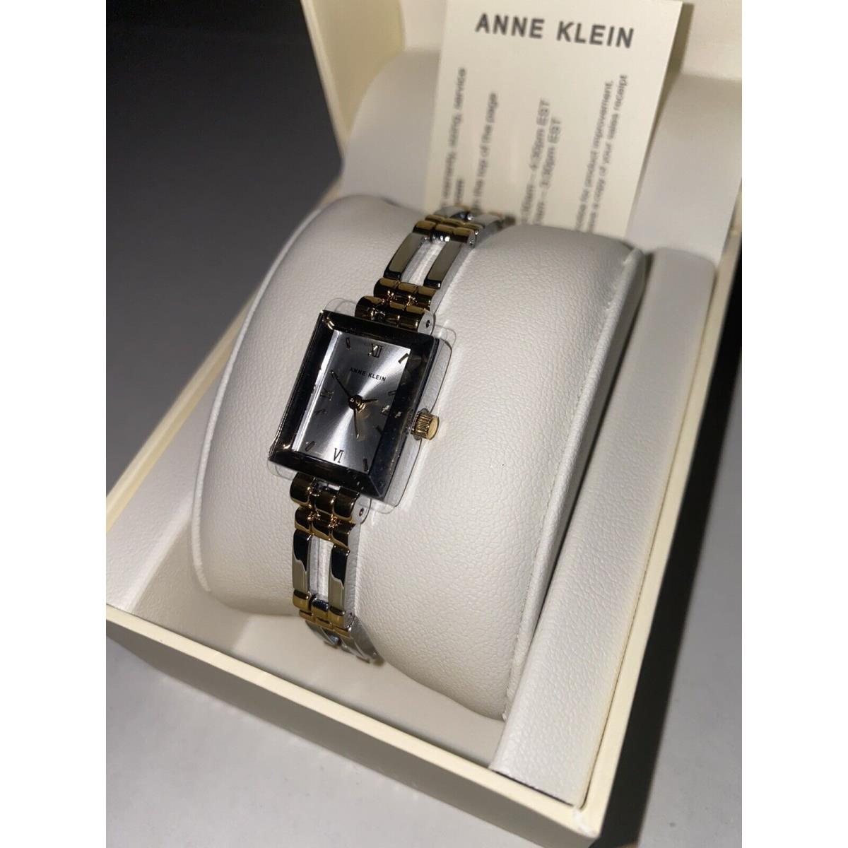 B1A Anne Klein 10-4899SVTT Wrist Watch For Women Silver Gold Stanless Steel