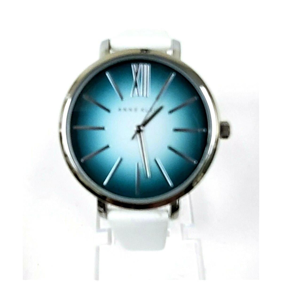 Anne Klein Silver Tone White Band Teal Green Dial Watch AK/1207