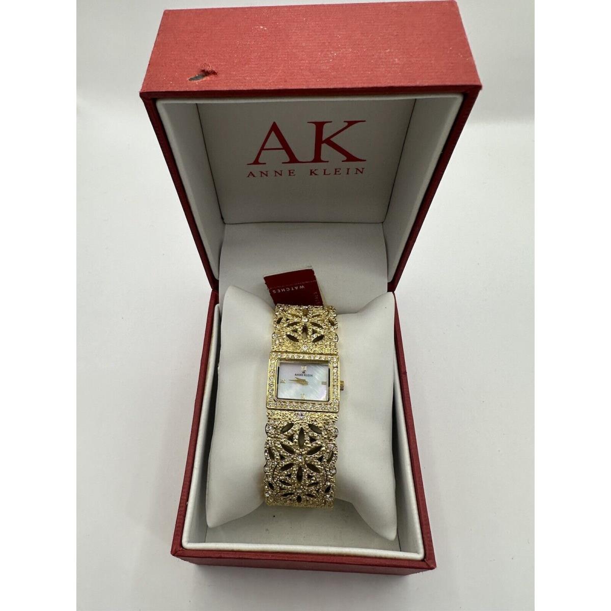 Anne Klein Womens Watch 10/8232 Battery Gold Tone 22MM 7 Mop U