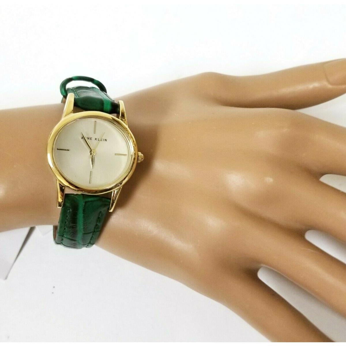 Anne Klein Gold Tone Croc Green Leather Backing Band Oval Watch AK/0216