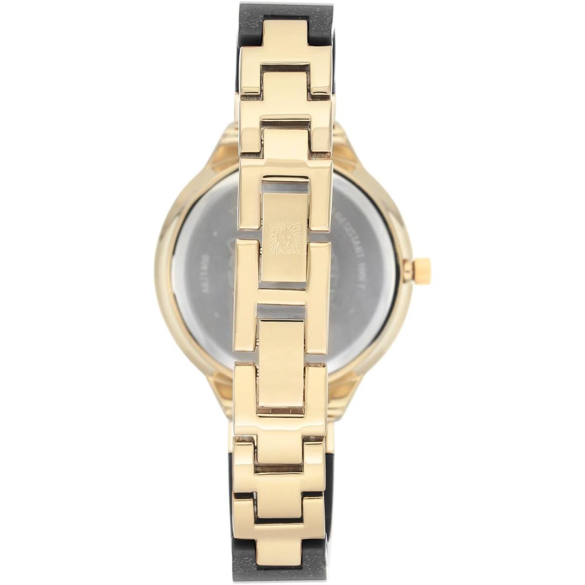 Anne Klein Women`s Premium Crystal Accented Resin Bangle Watch