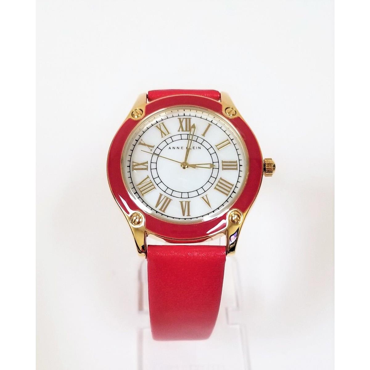 Anne Klein Gold Tone Fuchsia Leather Backing Roman `S Mop Watch AK/1782