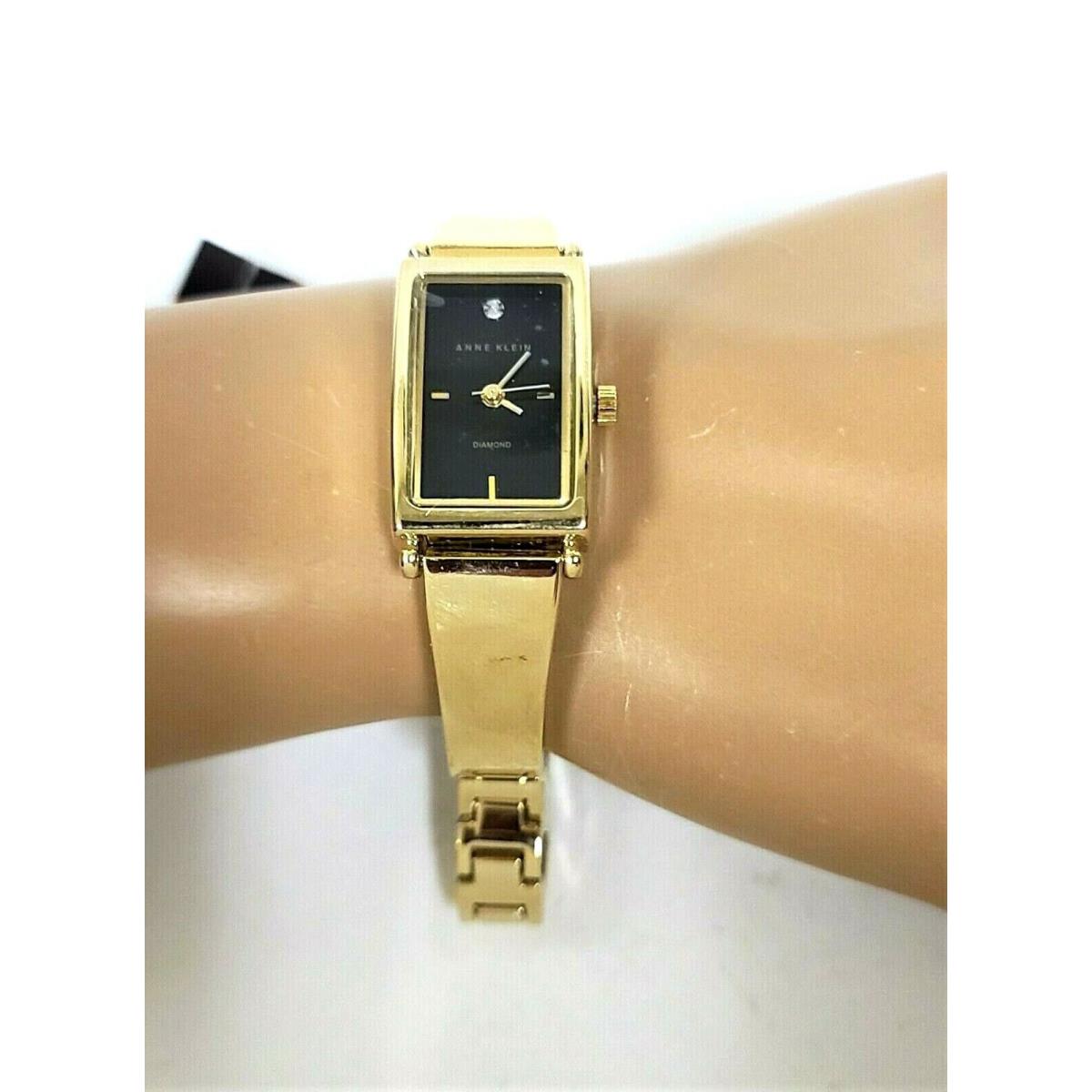 Anne Klein Gold Diamond Accent Rectangle Petite Bangle Watch AK/1730