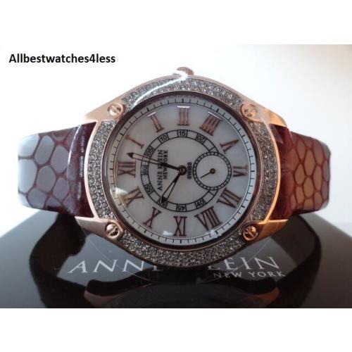 Anne Klein NY 12/2094WMRG Rose Gold Crystal Bezel Leather Band Women`s Watch