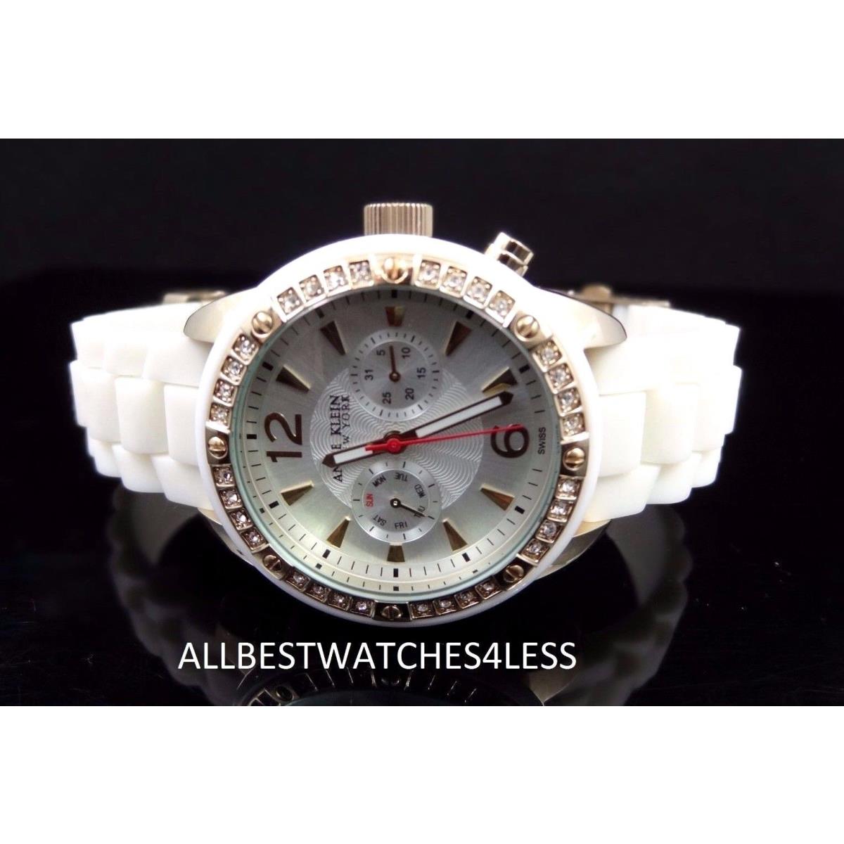 Anne Klein 12/2006SVWT Gold-tone Swarovski Crystal White Strap Women`s Watch