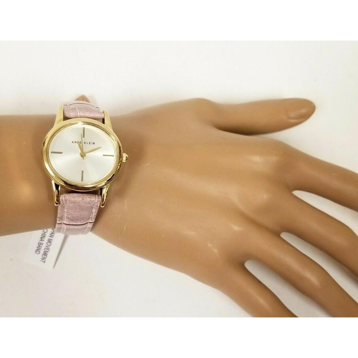 Anne Klein Gold Tone Pink Blossom Leather Backing Croc Band Oval Watch AK/0217