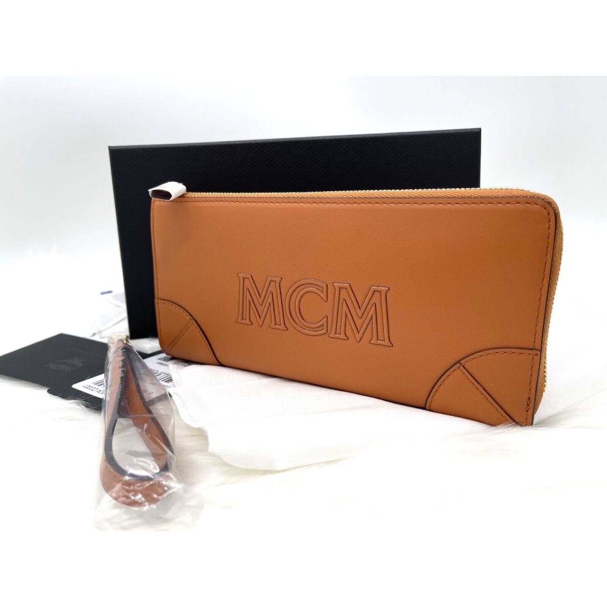 Mcm Aren Large Logo Zip Around Leather Wallet Wristlet In Cognac