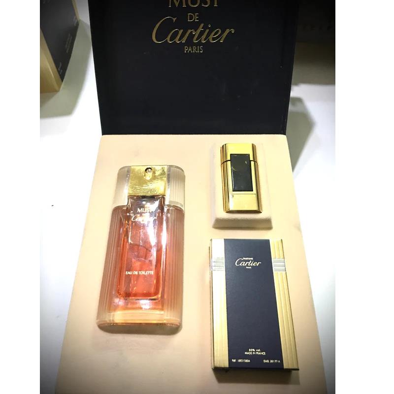 Women Must DE Cartier by Cartier Eau de Toilette Spray 1.6 Fl.oz + 0.13 Parfum