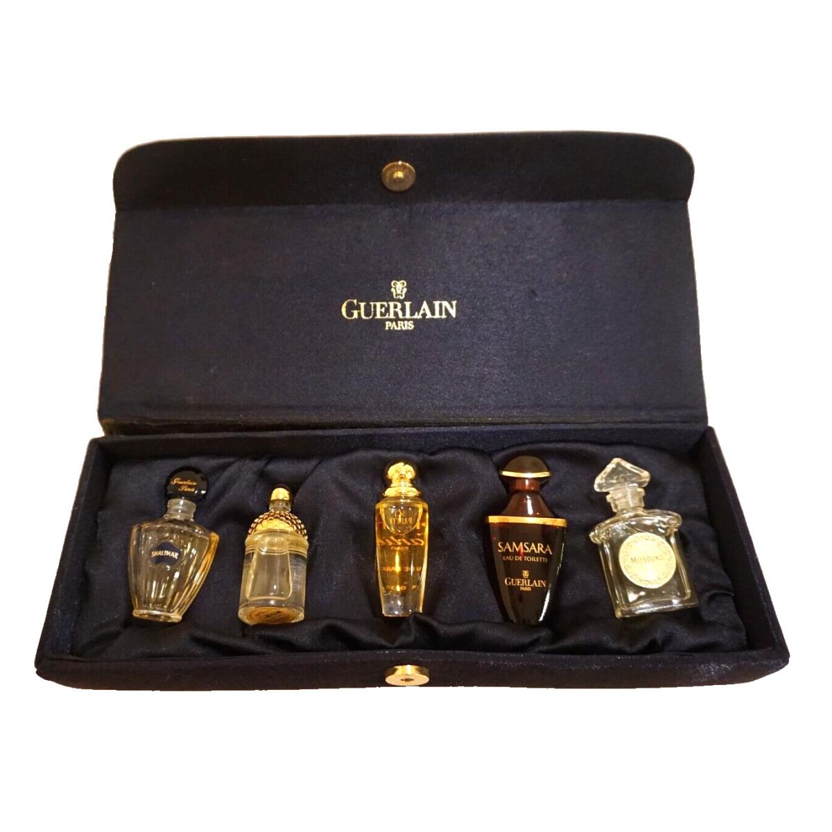 A Vintage Collection of 4 Pieces of Guerlain Miniatures and One Piece of Cartier