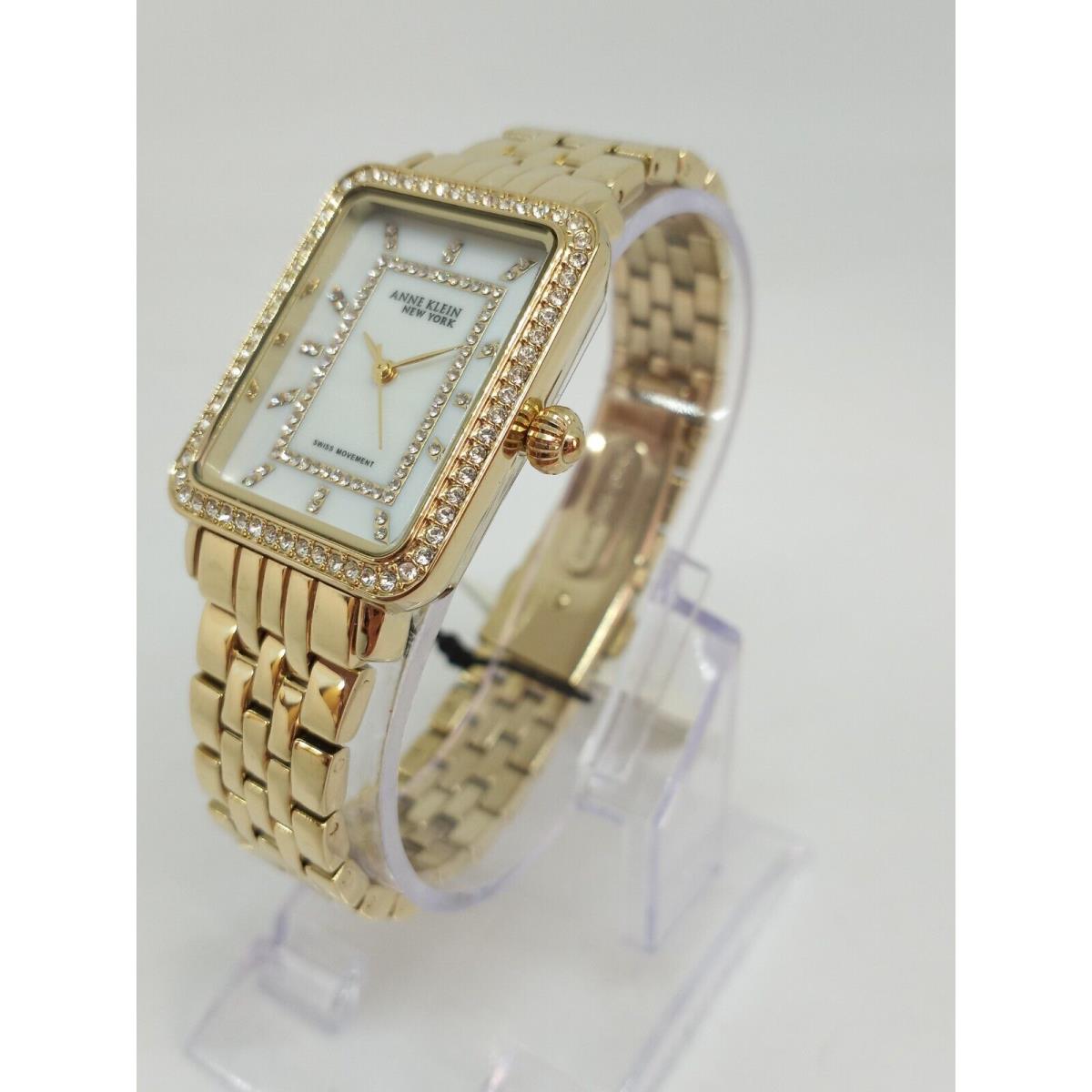 Anne Klein 12/2332MPGB Women`s 26mm x 33mm Gold Tone Mop Dial Crystal Watch