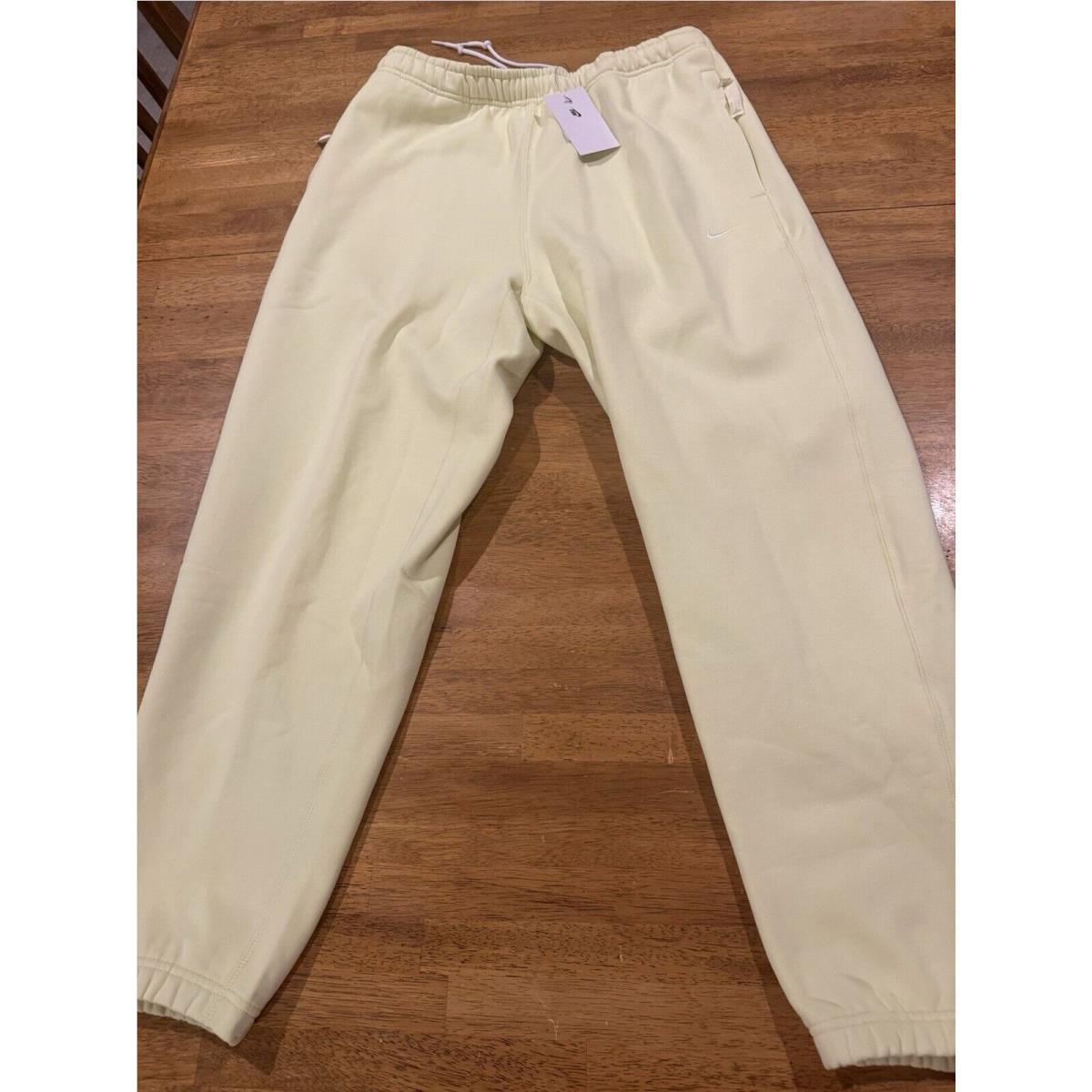 Nike Men s Essential Jogger Medium DX1364 331 Fleece Pants Light Yellow Tags